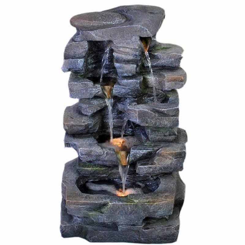 Αναμμένο σιντριβάνι με κλιμακωτό σχηματισμό βράχου