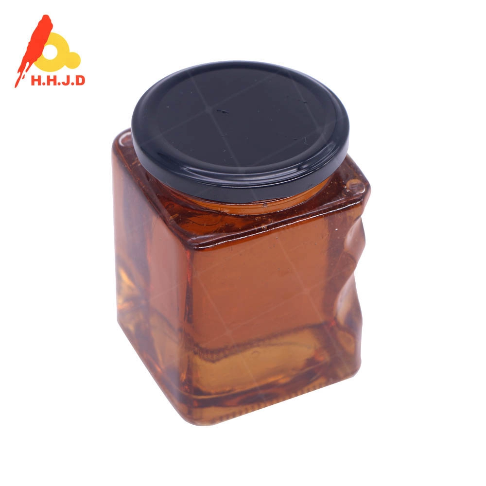 Μικρά μπουκάλια από γυάλινο βάζο αγνό φυσικό μέλι