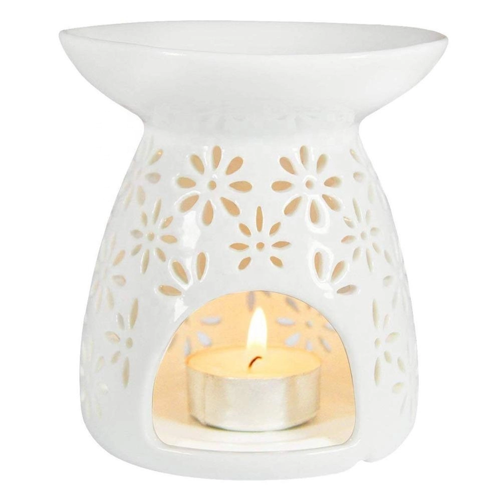 Σχήμα βάζου Milk White Ceramic Hollowing Floral Aroma Candle Warmers Oil Diffuser Καυστήρας