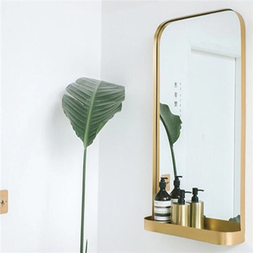 Καθρέφτης τοίχου με μεταλλικό λεπτό πλαίσιο με χρυσό και ράφι αποθήκευσης